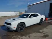 ✅ 2022 Dodge Challenger SXT • VIN: 2C3CDZGG1NH175759 • Lot: 40488201. Listed on IAAI with 10,675 mi. Free auction sales archive from the USA and detailed vehicle history report at DreamBid. Image 2.