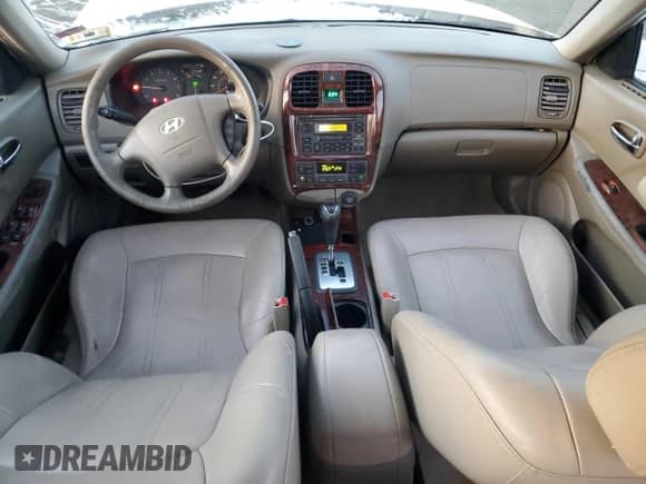 2003 Hyundai Sonata GLS с VIN KMHWF35HX3A756776, выставлен на аукционе Copart как лот 86134954 с пробегом 100 605 миль миль и Списание • Salvage title. История ставок и продаж доступна на DreamBid. Изображение 8.