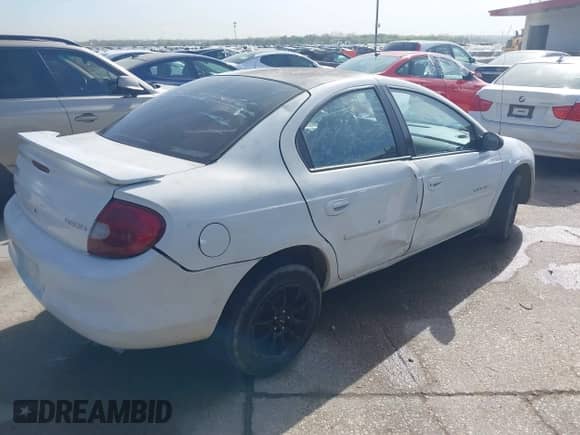 2000 Dodge Neon Highline z VIN 1B3ES46C7YD867085, wystawiony jako IAAI lot #41872411 z przebiegiem 190 734 mil mil oraz . Historia ofert i sprzedaży dostępna na DreamBid. Obrazek 4.