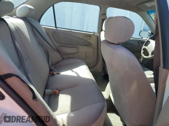 ✅ 2000 Toyota Corolla CE • VIN: 1NXBR12E3YZ302346 • Lot: 90586775. Wystawiony na Copart z przebiegiem 156 997 mil. Bezpłatny archiwum sprzedaży aukcyjnych z USA i szczegółowy raport historii pojazdu na DreamBid. Zdjęcie 10.