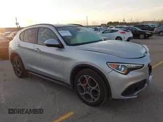 ✅ 2018 Alfa Romeo Stelvio Ti Sport • VIN: ZASFAKNN4J7B90019 • Lot: 43399343. Listed on IAAI with 107,538 mi. Free auction sales archive from the USA and detailed vehicle history report at DreamBid. Image 1.