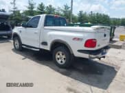 ✅ 2002 Ford F-150 • VIN: 2FTRF08L72CA57411 • Lot: 42569215. Wystawiony na IAAI z przebiegiem 95 881 mil. Bezpłatny archiwum sprzedaży aukcyjnych z USA i szczegółowy raport historii pojazdu na DreamBid. Zdjęcie 3.