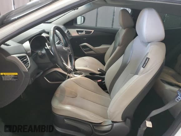 ✅ 2012 Hyundai Veloster w/Gray Int • VIN: KMHTC6AD2CU057401 • Lot: 75609614. Wystawiony na Copart z przebiegiem 196 250 mil. Bezpłatny archiwum sprzedaży aukcyjnych z USA i szczegółowy raport historii pojazdu na DreamBid. Zdjęcie 7.