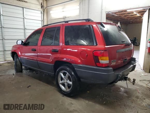 ✅ 2003 Jeep Grand Cherokee Laredo • VIN: 1J4GX48NX3C523895 • Lot: 87667925. Wystawiony na Copart z przebiegiem 235 145 mil. Bezpłatny archiwum sprzedaży aukcyjnych z USA i szczegółowy raport historii pojazdu na DreamBid. Zdjęcie 2.