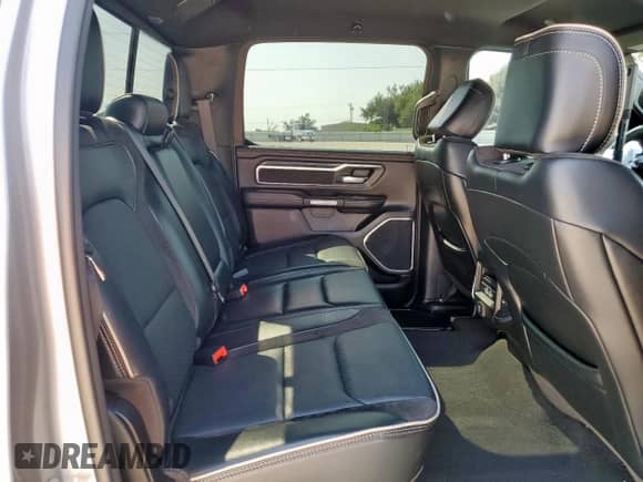 2023 Ram 1500 Laramie z VIN 1C6SRFJT7PN662379, wystawiony jako Copart lot #81452325 z przebiegiem 27 254 mil mil oraz Szkoda całkowita • Salvage title. Historia ofert i sprzedaży dostępna na DreamBid. Obrazek 10.