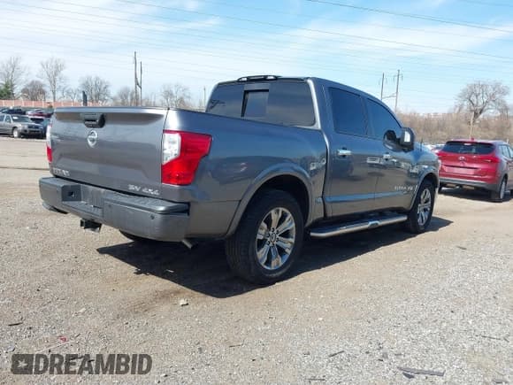 ✅ 2018 Nissan Titan SV • VIN: 1N6AA1E57JN551457 • Lot: 41790327. Listed on IAAI with 140,942 mi. Free auction sales archive from the USA and detailed vehicle history report at DreamBid. Image 4.