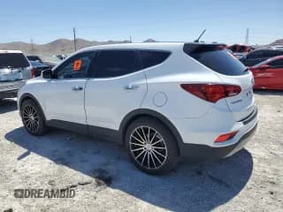 ✅ 2018 Hyundai Santa Fe 2.4L • VIN: 5NMZT3LB8JH105769 • Лот: 49332063. Опубликован ранее на Copart с пробегом 54 776 миль. Бесплатный доступ к архиву аукционных продаж из США и подробный отчёт об истории автомобиля на DreamBid. Изображение 2.