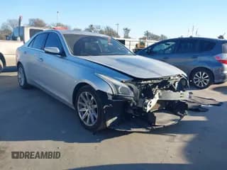 ✅ 2014 Cadillac CTS Luxury RWD • VIN: 1G6AR5S36E0181789 • Lot: 41769470. Listed on IAAI with 117,719 mi. Free auction sales archive from the USA and detailed vehicle history report at DreamBid. Image 1.