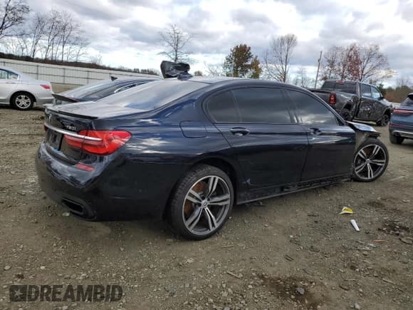 ✅ 2016 BMW 7 Series 750i xDrive • VIN: WBA7F2C58GG420149 • Lot: 92687385. Wystawiony na Copart z przebiegiem 96 532 mil. Bezpłatny archiwum sprzedaży aukcyjnych z USA i szczegółowy raport historii pojazdu na DreamBid. Zdjęcie 3.
