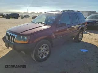 ✅ 2001 Jeep Grand Cherokee Laredo • VIN: 1J4GW48N71C547233 • Lot: 94404115. Listed on Copart with 199,377 mi. Free auction sales archive from the USA and detailed vehicle history report at DreamBid. Image 1.
