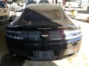 ✅ 2015 Aston Martin Rapide • VIN: SCFEKBCR4FGS02203 • Лот: 84002034. Опубликован ранее на Copart с пробегом 32 034 миль. Бесплатный доступ к архиву аукционных продаж из США и подробный отчёт об истории автомобиля на DreamBid. Изображение 6.