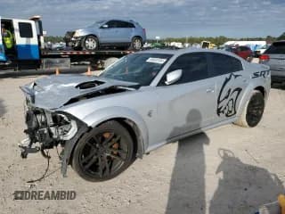 ✅ 2022 Dodge Charger SRT Hellcat Widebody • VIN: 2C3CDXL93NH113954 • Lot: 86603164. Listed on Copart with 6,436 mi. Free auction sales archive from the USA and detailed vehicle history report at DreamBid. Image 1.