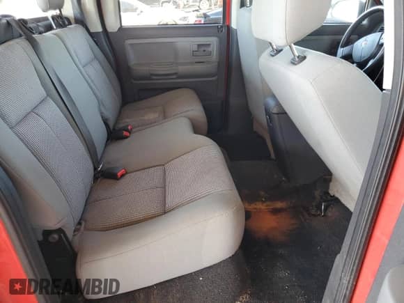 2010 Dodge Dakota Bighorn/Lonestar z VIN 1D7CE3GK9AS163619, wystawiony jako Copart lot #77604814 z przebiegiem 187 461 mil mil oraz Czysty tytuł • Clean title. Historia ofert i sprzedaży dostępna na DreamBid. Obrazek 10.