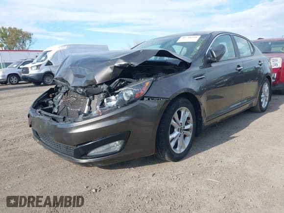 ✅ 2011 Kia Optima EX • VIN: KNAGN4A60B5142149 • Lot: 40758358. Listed on IAAI with 151,166 mi. Free auction sales archive from the USA and detailed vehicle history report at DreamBid. Image 18.