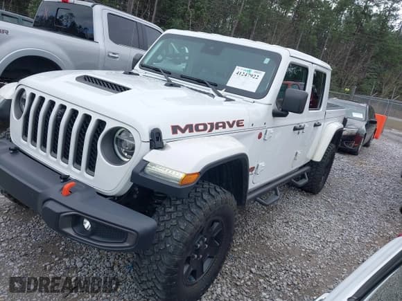 ✅ 2020 Jeep Gladiator Mojave • VIN: 1C6JJTEG7LL206581 • Lot: 41247922. Listed on IAAI with 27,876 mi. Free auction sales archive from the USA and detailed vehicle history report at DreamBid. Image 2.