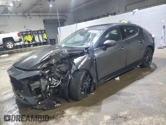 ✅ 2021 Mazda 3 Premium • VIN: JM1BPBMLXM1310760 • Lot: 43304925. Listed on Copart with 51,207 mi. Free auction sales archive from the USA and detailed vehicle history report at DreamBid. Image 1.