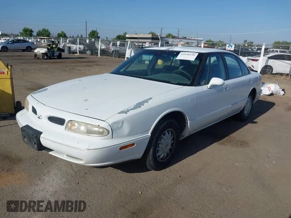 ✅ 1999 Oldsmobile 88 LS • VIN: 1G3HN52KXX4805006 • Lot: 42438259. Listed on IAAI with 127,002 mi. Free auction sales archive from the USA and detailed vehicle history report at DreamBid. Image 2.