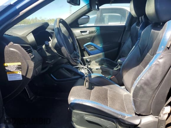 ✅ 2016 Hyundai Veloster Turbo Rally Edition • VIN: KMHTC6AE1GU263047 • Lot: 47547215. Wystawiony na Copart z przebiegiem 131 304 mil. Bezpłatny archiwum sprzedaży aukcyjnych z USA i szczegółowy raport historii pojazdu na DreamBid. Zdjęcie 7.