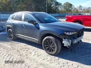 ✅ 2025 Mazda CX-50 S Preferred • VIN: 7MMVABBM6SN311937 • Lot: 43663298. Listed on IAAI with 21,125 mi. Free auction sales archive from the USA and detailed vehicle history report at DreamBid. Image 1.