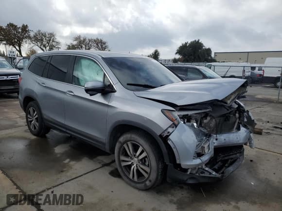 ✅ 2018 Honda Pilot EX • VIN: 5FNYF6H44JB067702 • Lot: 84686354. Listed on Copart with 126,464 mi. Free auction sales archive from the USA and detailed vehicle history report at DreamBid. Image 4.