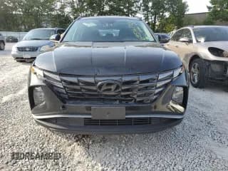 ✅ 2022 Hyundai Tucson SEL • VIN: KM8JBDA29NU071120 • Lot: 69516743. Wystawiony na Copart z przebiegiem 21 327 mil. Bezpłatny archiwum sprzedaży aukcyjnych z USA i szczegółowy raport historii pojazdu na DreamBid. Zdjęcie 5.