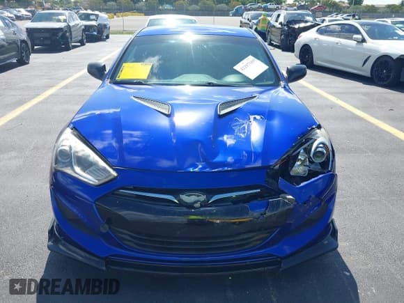 ✅ 2013 Hyundai Genesis Coupe 2.0T • VIN: KMHHT6KD1DU090198 • Lot: 42297169. Wystawiony na IAAI z przebiegiem 69 501 mil. Bezpłatny archiwum sprzedaży aukcyjnych z USA i szczegółowy raport historii pojazdu na DreamBid. Zdjęcie 12.