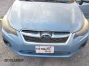 ✅ 2012 Subaru Impreza Premium • VIN: JF1GPAE67CH230918 • Lot: 43383808. Listed on IAAI with 124,512 mi. Free auction sales archive from the USA and detailed vehicle history report at DreamBid. Image 6.