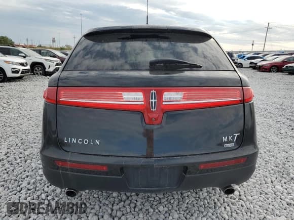 ✅ 2014 Lincoln MKT • VIN: 2LMHJ5NK5EBL57784 • Lot: 69826634. Wystawiony na Copart z przebiegiem 294 854 mil. Bezpłatny archiwum sprzedaży aukcyjnych z USA i szczegółowy raport historii pojazdu na DreamBid. Zdjęcie 6.