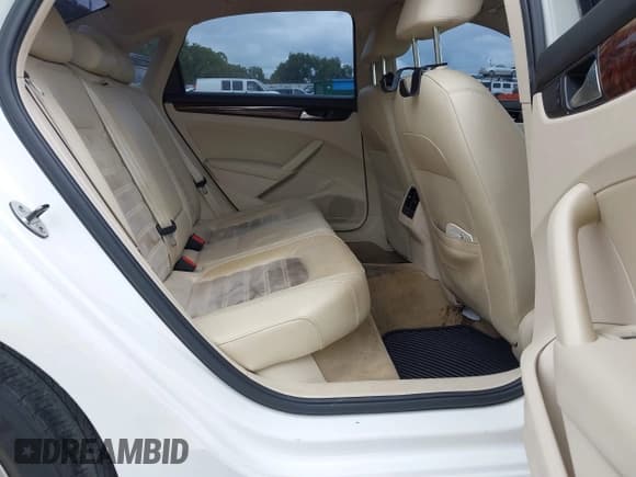 ✅ 2013 Volkswagen Passat SEL • VIN: 1VWCP7A37DC070316 • Lot: 42920334. Listed on IAAI with 211,425 mi. Free auction sales archive from the USA and detailed vehicle history report at DreamBid. Image 8.