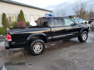 ✅ 2002 Dodge Dakota Sport • VIN: 1B7HG38N22S501091 • Lot: 82390054. Wystawiony na Copart z przebiegiem 104 300 mil. Bezpłatny archiwum sprzedaży aukcyjnych z USA i szczegółowy raport historii pojazdu na DreamBid. Zdjęcie 3.