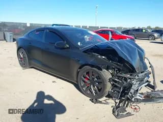 ✅ 2024 Tesla Model S Plaid • VIN: 5YJSA1E69RF544911 • Lot: 40907646. Listed on IAAI with Not provided. Free auction sales archive from the USA and detailed vehicle history report at DreamBid. Image 1.
