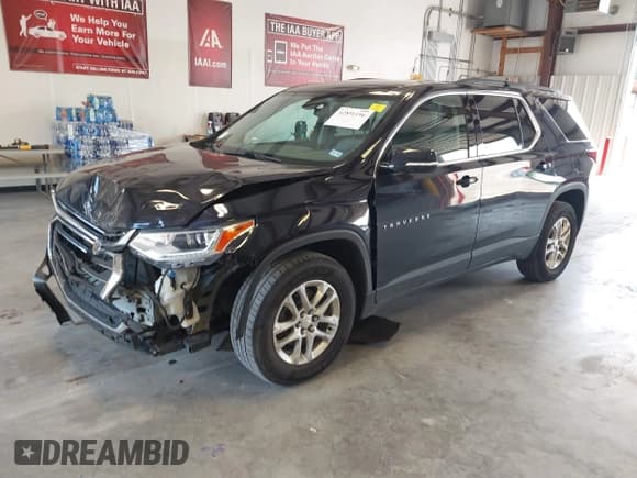 ✅ 2020 Chevrolet Traverse LT Cloth • VIN: 1GNEVGKW2LJ133978 • Lot: 42891196. Listed on IAAI with 99,472 mi. Free auction sales archive from the USA and detailed vehicle history report at DreamBid. Image 2.