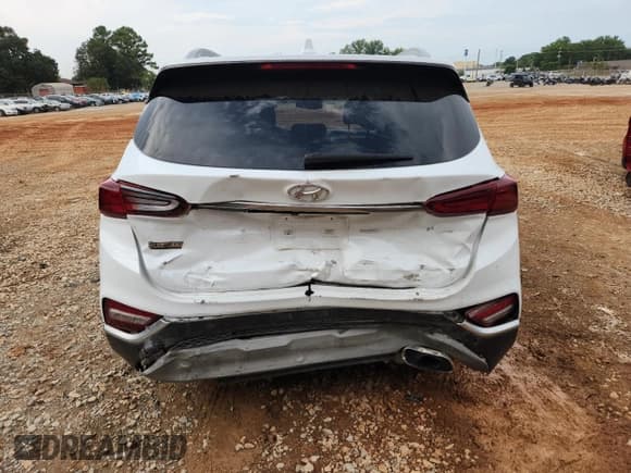 ✅ 2020 Hyundai Santa Fe SEL • VIN: 5NMS33ADXLH144985 • Лот: 81718315. Опубликован ранее на Copart с пробегом 79 819 миль. Бесплатный доступ к архиву аукционных продаж из США и подробный отчёт об истории автомобиля на DreamBid. Изображение 6.