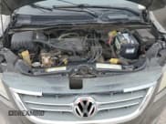 ✅ 2010 Volkswagen Routan SE • VIN: 2V4RW3D11AR272757 • Lot: 82049925. Listed on Copart with 160,569 mi. Free auction sales archive from the USA and detailed vehicle history report at DreamBid. Image 12.