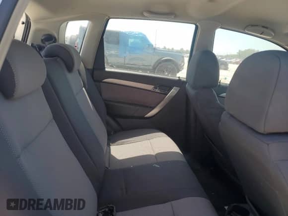 2009 Chevrolet Aveo 1LT with VIN KL1TD66E09B338773, listed as a Copart auction lot 52575765 with 102,617 mi miles and Salvage title. Bid and sale history available at DreamBid. Image 10.