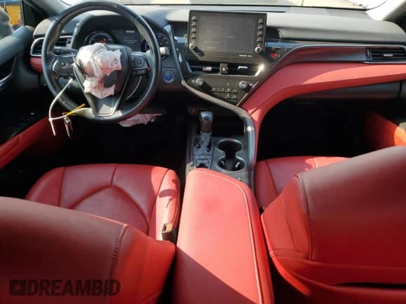 2021 Toyota Camry Hybrid XSE с VIN 4T1K31AKXMU548944, выставлен на аукционе Copart как лот 68894265 с пробегом 81 648 миль миль и Списание • Salvage title. История ставок и продаж доступна на DreamBid. Изображение 8.