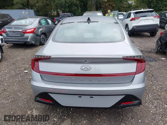 2023 Hyundai Sonata SEL z VIN KMHL64JA4PA313904, wystawiony jako IAAI lot #43266884 z przebiegiem 7 403 mil mil oraz . Historia ofert i sprzedaży dostępna na DreamBid. Obrazek 16.