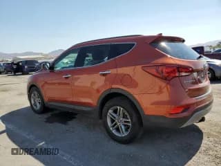 ✅ 2018 Hyundai Santa Fe 2.4L • VIN: 5XYZU3LB0JG521855 • Лот: 59522673. Опубликован ранее на Copart с пробегом 81 482 миль. Бесплатный доступ к архиву аукционных продаж из США и подробный отчёт об истории автомобиля на DreamBid. Изображение 2.