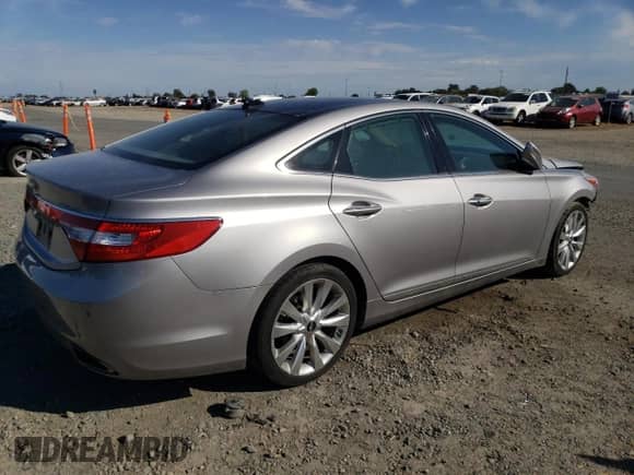 2012 Hyundai Azera with VIN KMHFH4JG7CA124394, listed as a Copart auction lot 81489605 with 61,823 mi miles and Salvage title. Bid and sale history available at DreamBid. Image 3.