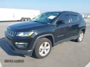 ✅ 2019 Jeep Compass Latitude • VIN: 3C4NJDBB7KT761185 • Lot: 42357723. Listed on IAAI with 100,376 mi. Free auction sales archive from the USA and detailed vehicle history report at DreamBid. Image 2.