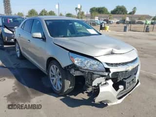 2016 Chevrolet Malibu LTZ z VIN 1G11E5SAXGF105153, wystawiony jako IAAI lot #43159960 z przebiegiem 145 269 mil mil oraz . Historia ofert i sprzedaży dostępna na DreamBid. Obrazek 1.