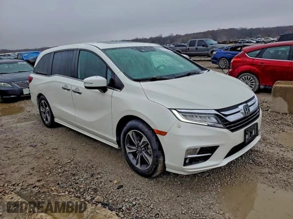 ✅ 2018 Honda Odyssey Touring • VIN: 5FNRL6H88JB053124 • Lot: 93779525. Wystawiony na Copart z przebiegiem 106 865 mil. Bezpłatny archiwum sprzedaży aukcyjnych z USA i szczegółowy raport historii pojazdu na DreamBid. Zdjęcie 4.