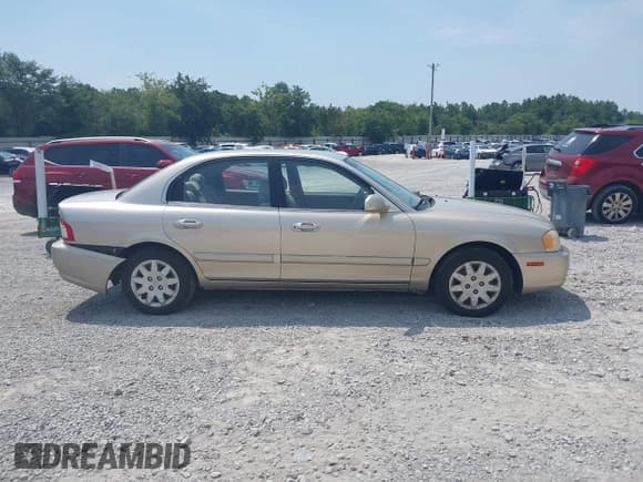 ✅ 2004 Kia Optima LX • VIN: KNAGD126845341047 • Лот: 42588996. Опубликован ранее на IAAI с пробегом 100 925 миль. Бесплатный доступ к архиву аукционных продаж из США и подробный отчёт об истории автомобиля на DreamBid. Изображение 13.