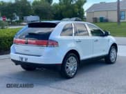 ✅ 2009 Lincoln MKX • VIN: 2LMDU68C69BJ11591 • Lot: 80904695. Listed on Copart with 126,551 mi. Free auction sales archive from the USA and detailed vehicle history report at DreamBid. Image 4.