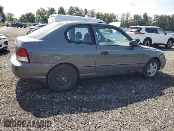 2001 Hyundai Accent GS with VIN KMHCG35C91U131429, listed as a Copart auction lot 65850374 with 46,282 mi miles and Clean title. Bid and sale history available at DreamBid. Image 3.