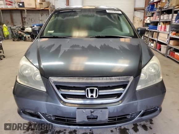 ✅ 2006 Honda Odyssey EX • VIN: 5FNRL38426B455322 • Lot: 86608495. Listed on Copart with 135,114 mi. Free auction sales archive from the USA and detailed vehicle history report at DreamBid. Image 5.