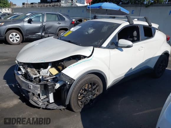 ✅ 2020 Toyota C-HR LE • VIN: JTNKHMBX6L1080899 • Lot: 42595713. Listed on IAAI with 63,777 mi. Free auction sales archive from the USA and detailed vehicle history report at DreamBid. Image 2.