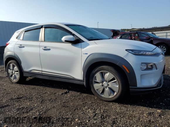 2020 Hyundai Kona Ultimate with VIN KM8K53AG9LU083122, listed as a Copart auction lot 69059265 with 102,693 mi miles and Salvage title. Bid and sale history available at DreamBid. Image 4.