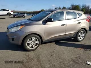 2011 Hyundai Tucson GL z VIN KM8JT3AB1BU215939, wystawiony jako Copart lot #85272455 z przebiegiem 163 546 mil mil oraz Szkoda całkowita • Salvage title. Historia ofert i sprzedaży dostępna na DreamBid. Obrazek 1.