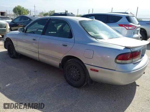 ✅ 1995 Mazda 626 DX • VIN: 1YVGE22C2S5375147 • Lot: 42821433. Listed on IAAI with 201,088 mi. Free auction sales archive from the USA and detailed vehicle history report at DreamBid. Image 3.